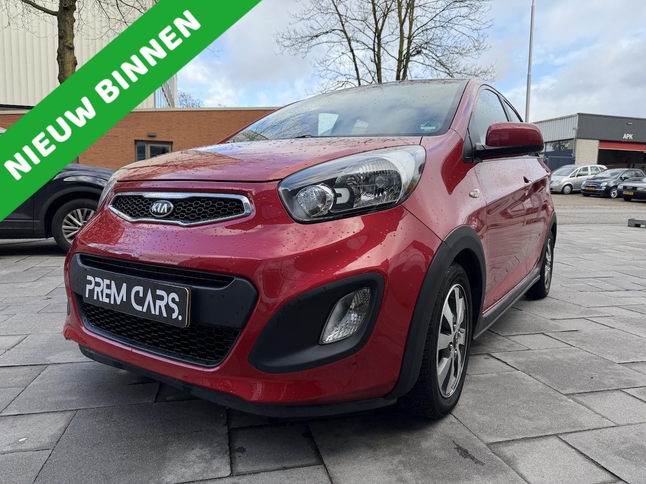 Kia Picanto - 1.2 CVVT ISG R-Cross Signal Red | 76.434 KM - AutoWereld.nl