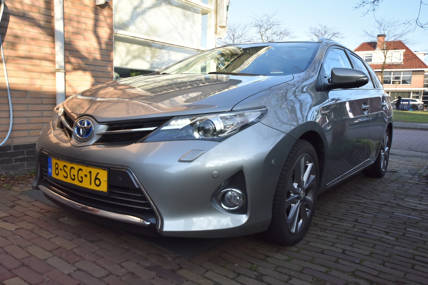 Toyota Auris Touring Sports - 1.8 Hybrid Lease Pro Toyota Auris 1.8 HYBRID TOURING SPORTS CVT - AutoWereld.nl