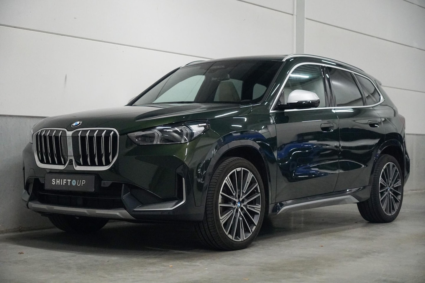 BMW X1 - sDrive18i Panoramadak | Harman Kardon | Head Up | Stuurverwarming - AutoWereld.nl