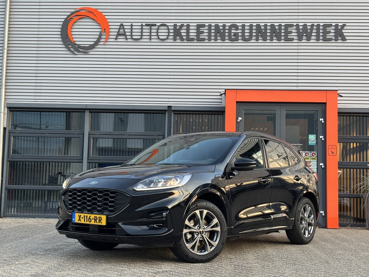 Ford Kuga - 2.5 PHEV ST-Line / Allseason Banden / Trekhaak / Schuifkanteldak / Applecarplay/Androidaut - AutoWereld.nl