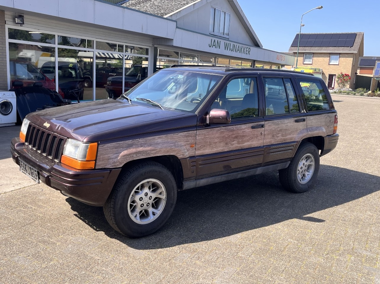 Jeep Grand Cherokee - 5.2i V8 Limited - AutoWereld.nl