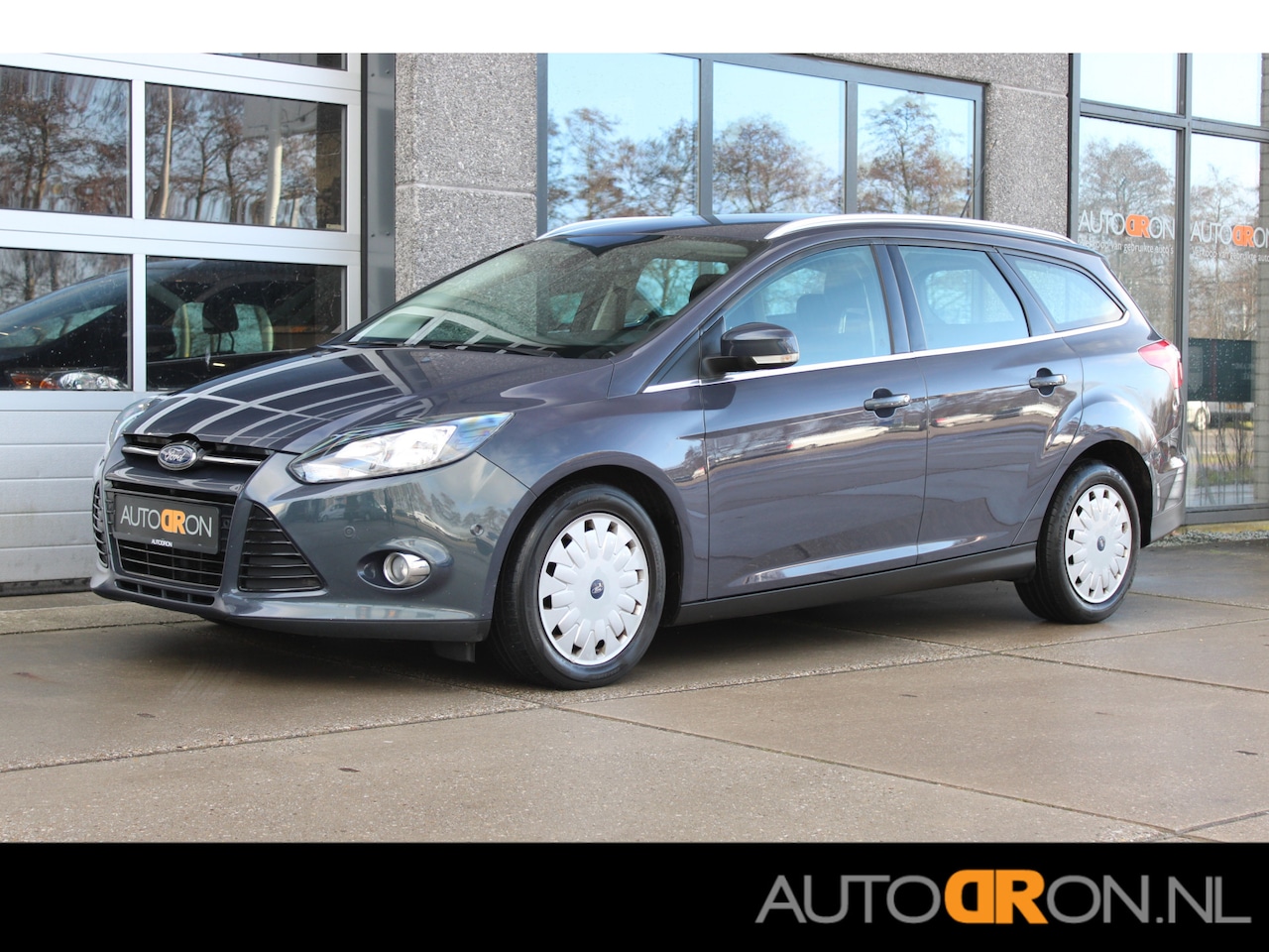 Ford Focus Wagon - 1.6 TDCI Titanium Navigatie Cruise Control PDC - AutoWereld.nl