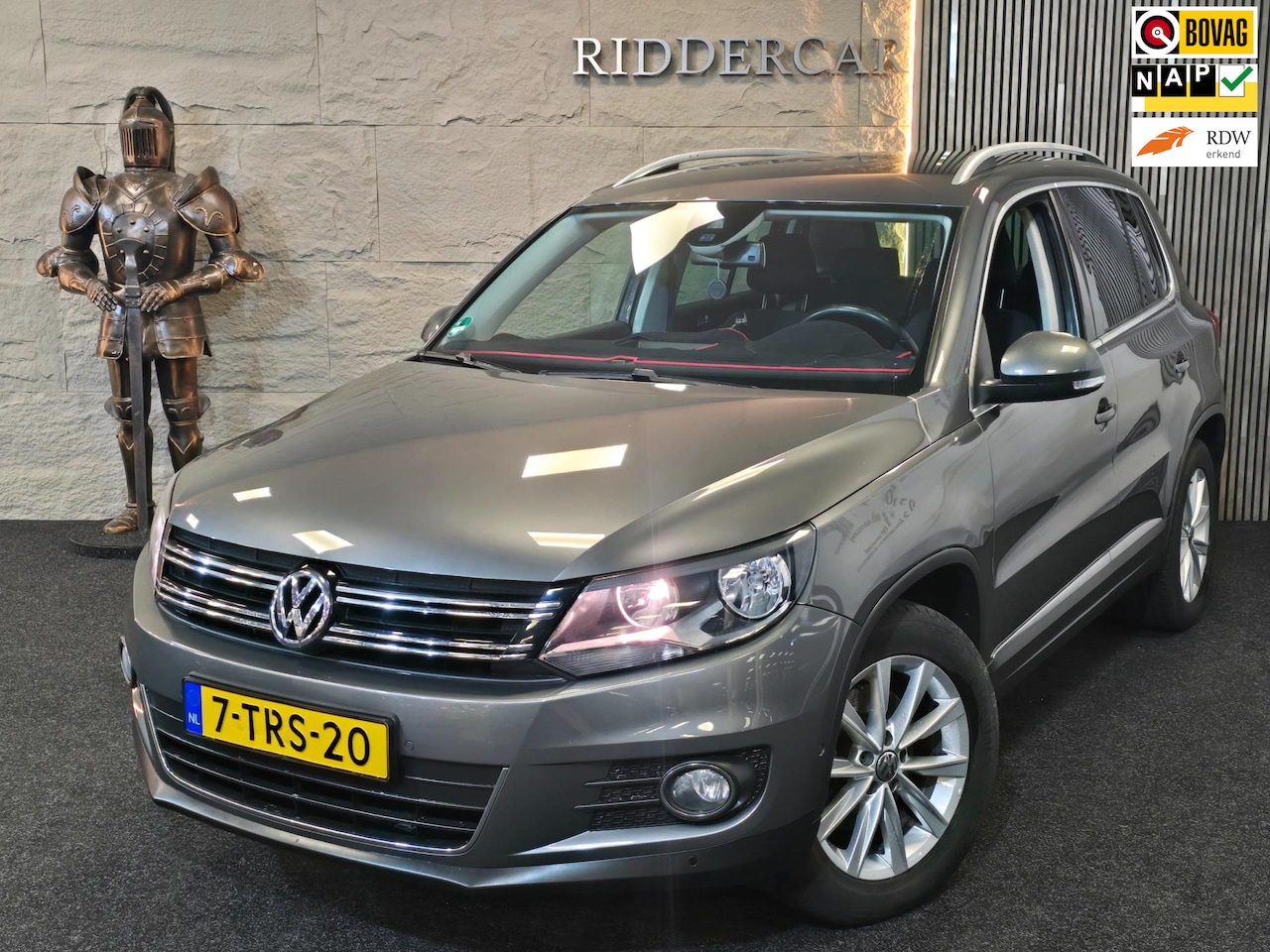 Volkswagen Tiguan - 1.4 TSI Sport&Style|GARANTIE|TREKHAAK|NAP|2E EIG|NAVI|CRUISE|CAMERA - AutoWereld.nl