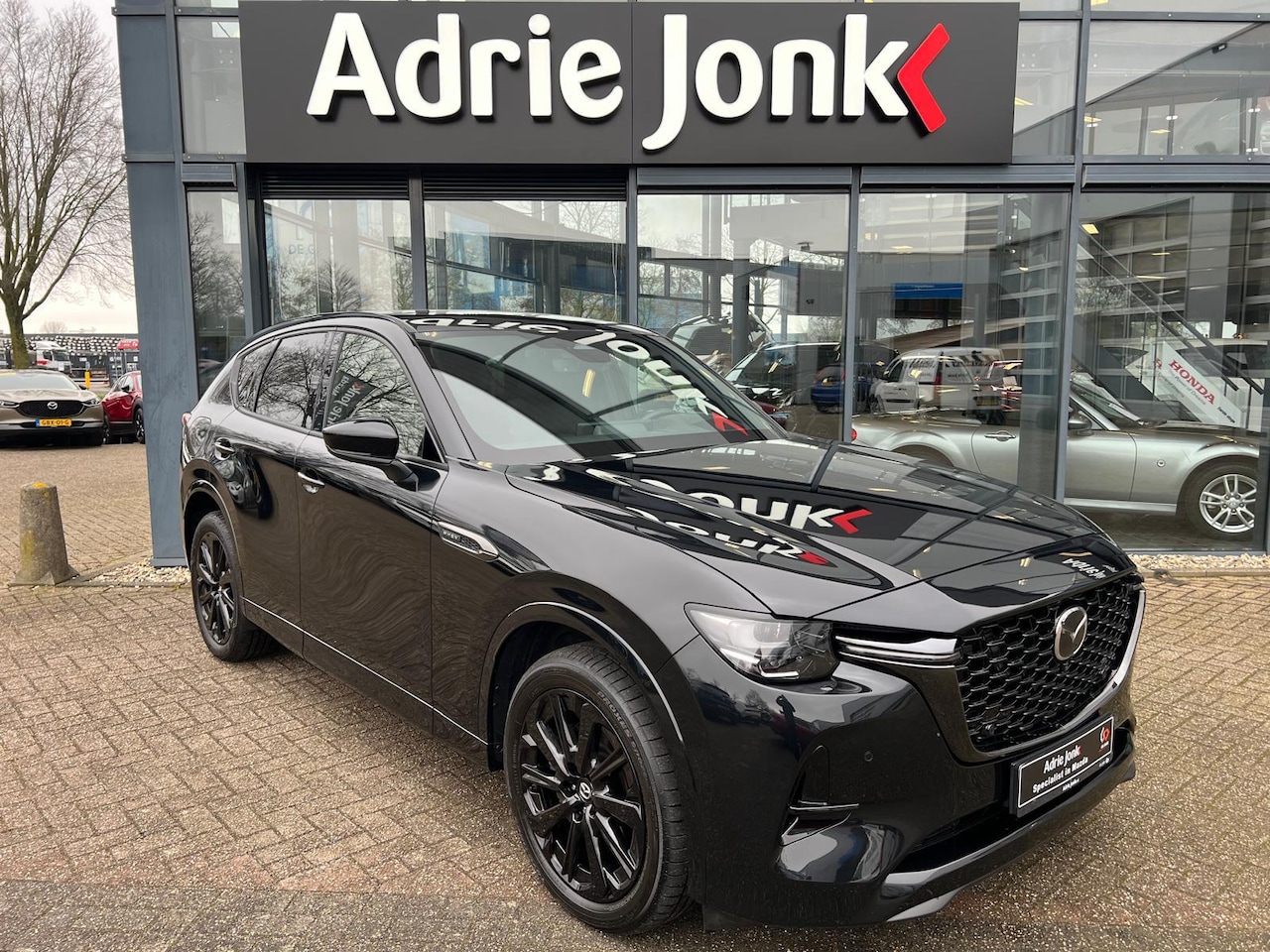 Mazda CX-60 - 2.5 e-SkyActiv PHEV Homura Plus AUTOMAAT | PLUG-IN HYBRID | MEEST LUXE UITVOERING | PANORA - AutoWereld.nl