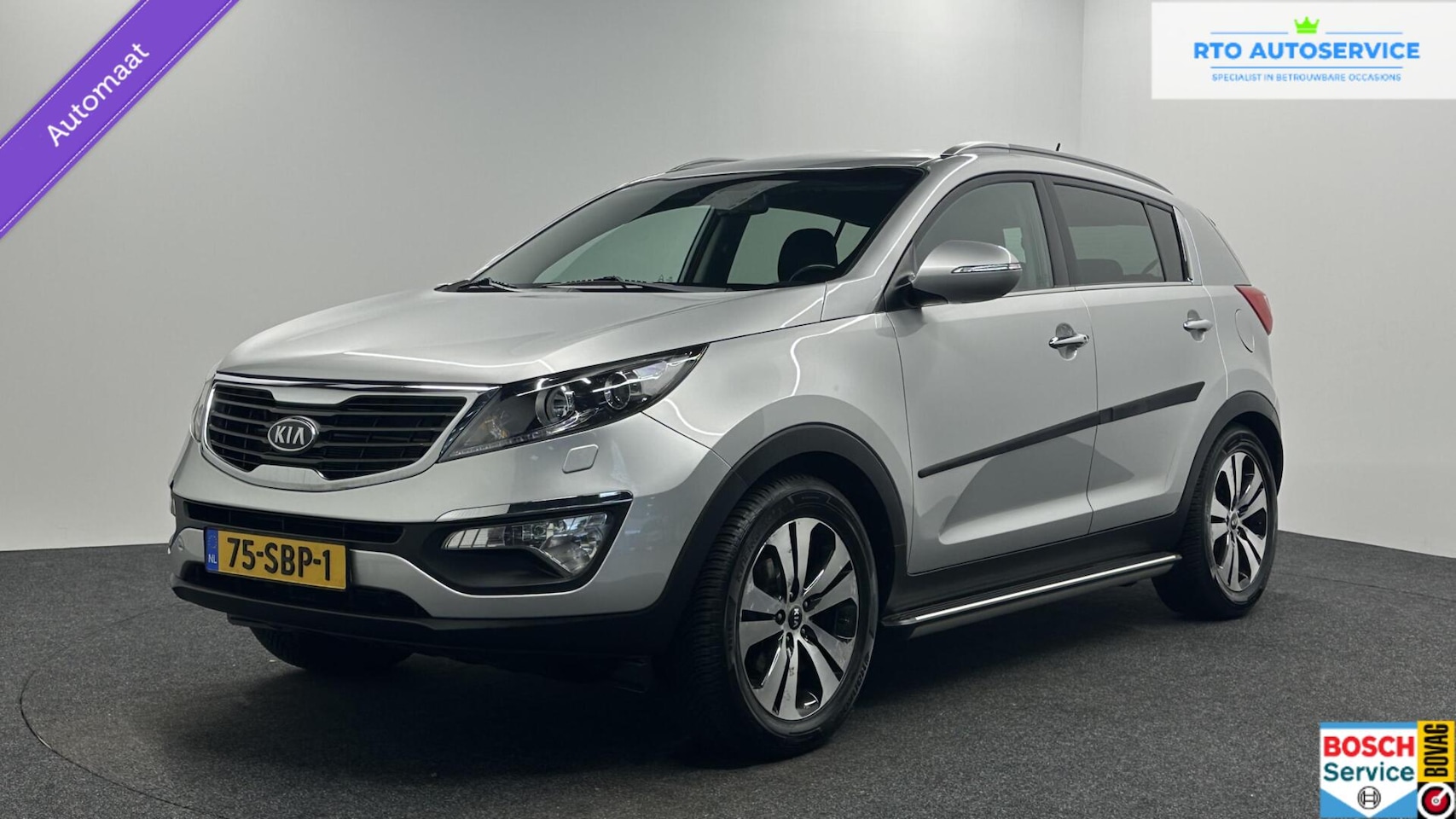 Kia Sportage - 2.0 X-clusive LEER NAVI CRUISE TREKHAAK ECC. - AutoWereld.nl