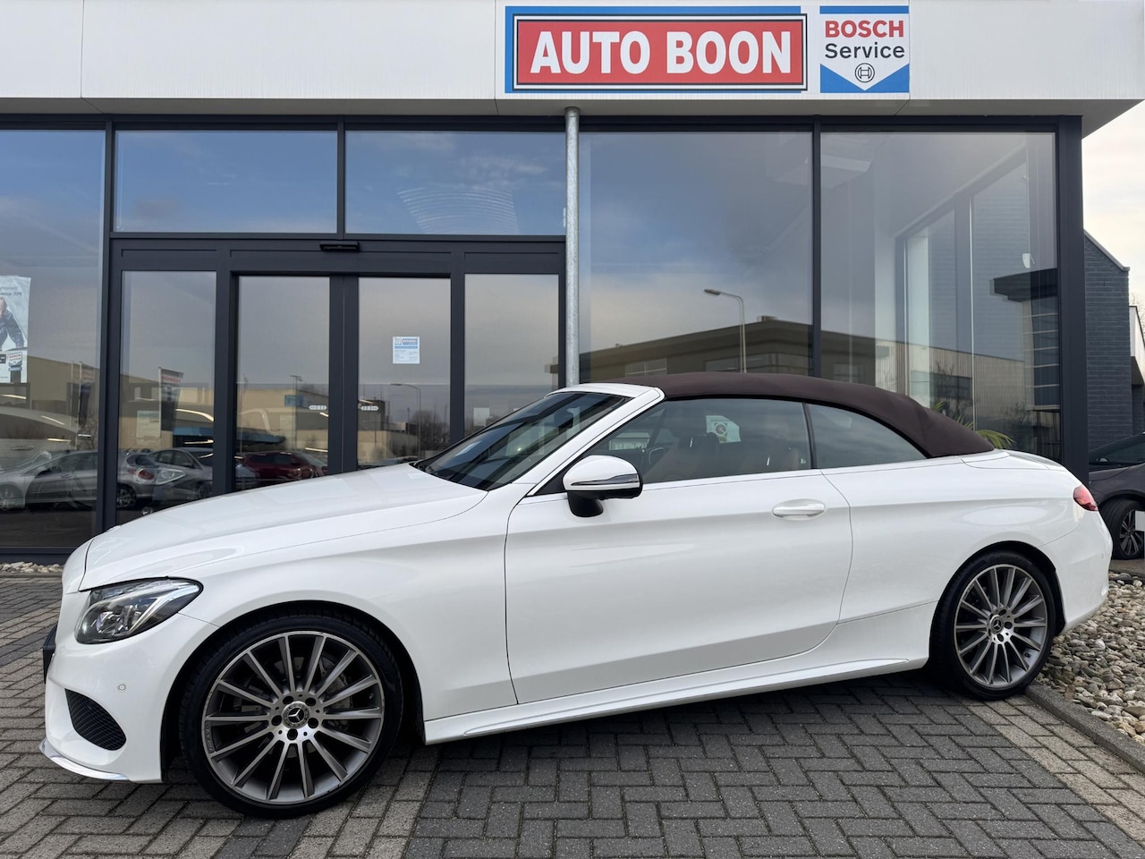 Mercedes-Benz C-klasse Cabrio - 180 AMG 9G-TRONIC BURMESTER/MEMORY/SFEER/P-CAM360 /LEER/NAVI/19”AMG/LED/STOELV./CLIMA/CABR - AutoWereld.nl