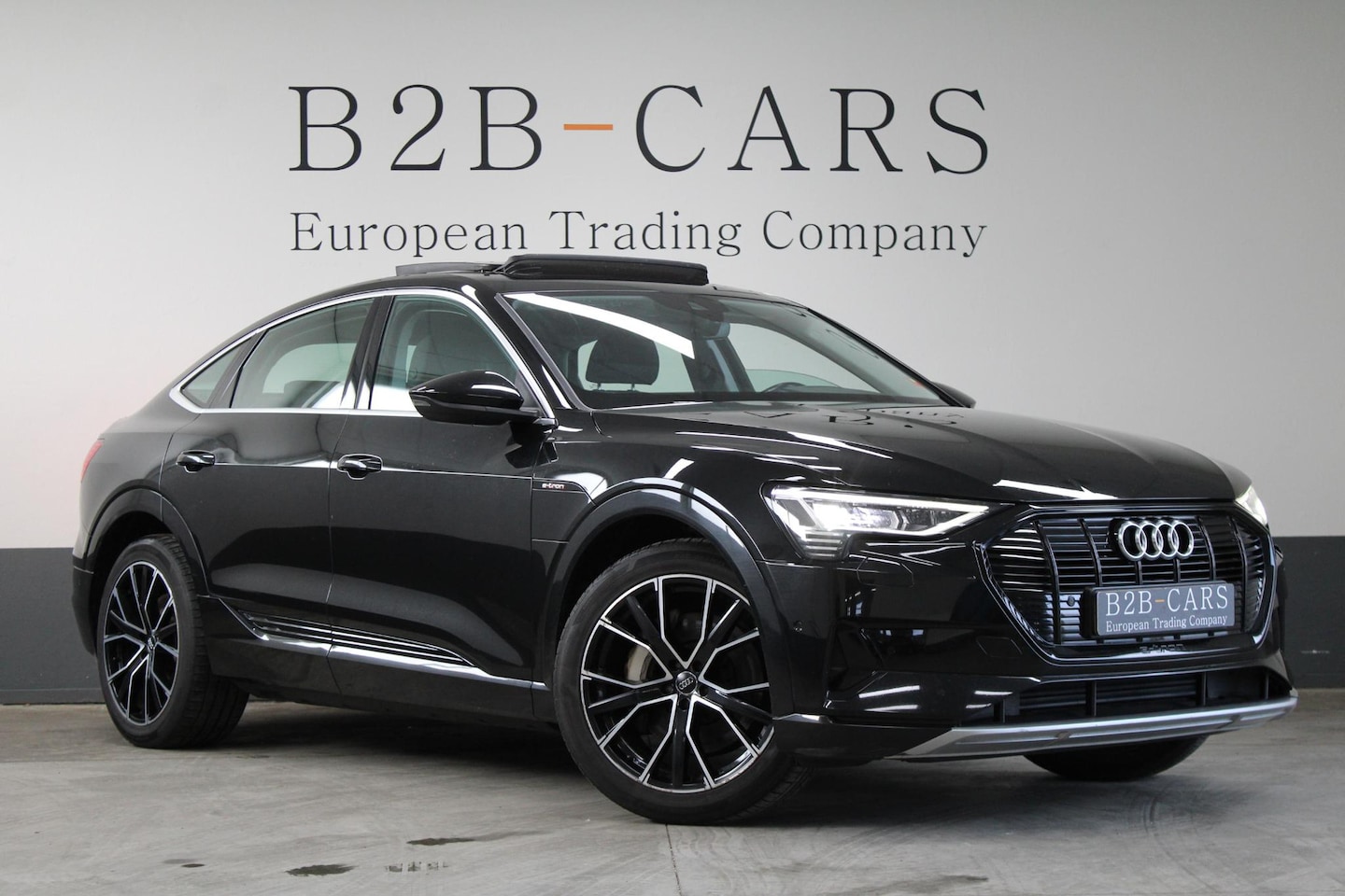 Audi e-tron Sportback - 55 quattro edition 95 kWh SOH 89% - Panoramadak - Trekhaak - AutoWereld.nl