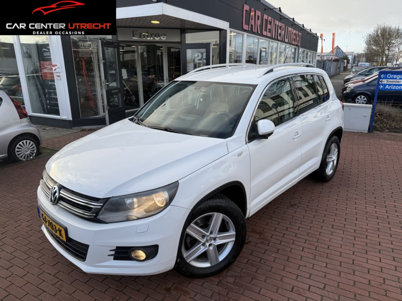 Volkswagen Tiguan - 1.4 TSI Sport&St. 4M - AutoWereld.nl