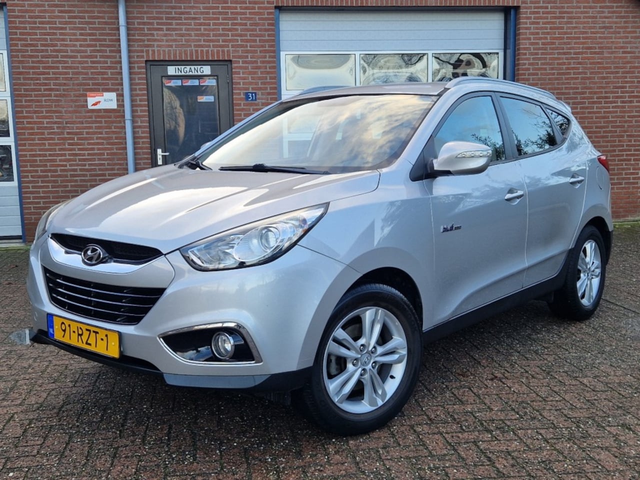 Hyundai ix35 - 1.6i GDI Business Edition NL-auto Navi Clima Cruise Camera Dealer OH - AutoWereld.nl