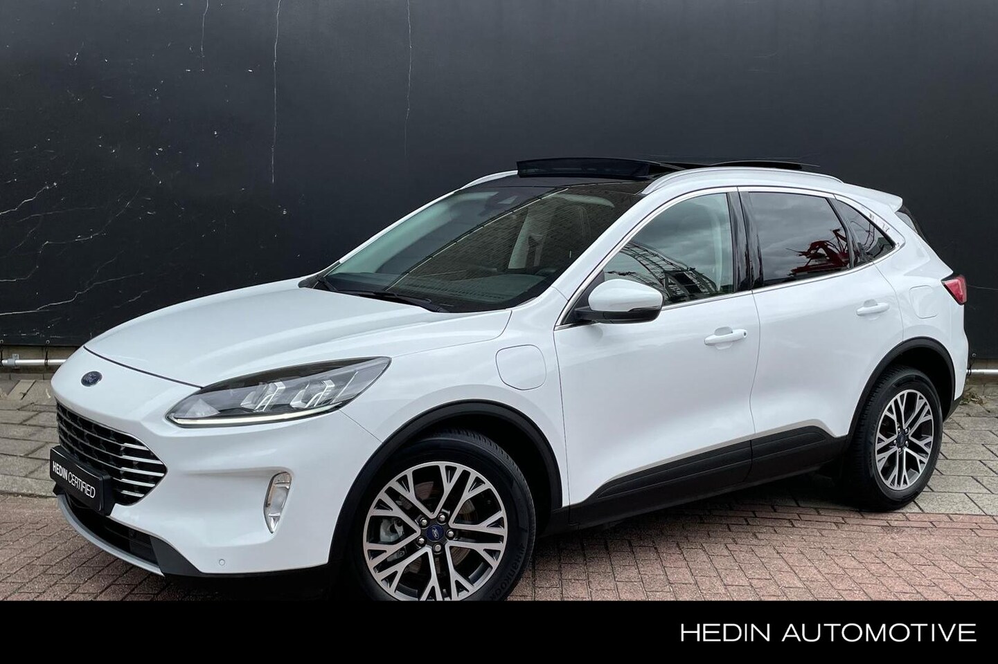 Ford Kuga - 2.5 PHEV Titanium | Trekhaak | Panorama Dak | Stoelverwarming | Draadloze Telefoonlader | - AutoWereld.nl