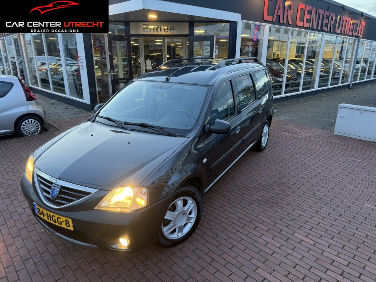 Dacia Logan MCV - 1.6-16V Lauréate 7p. airco cruise control trekhaak - AutoWereld.nl