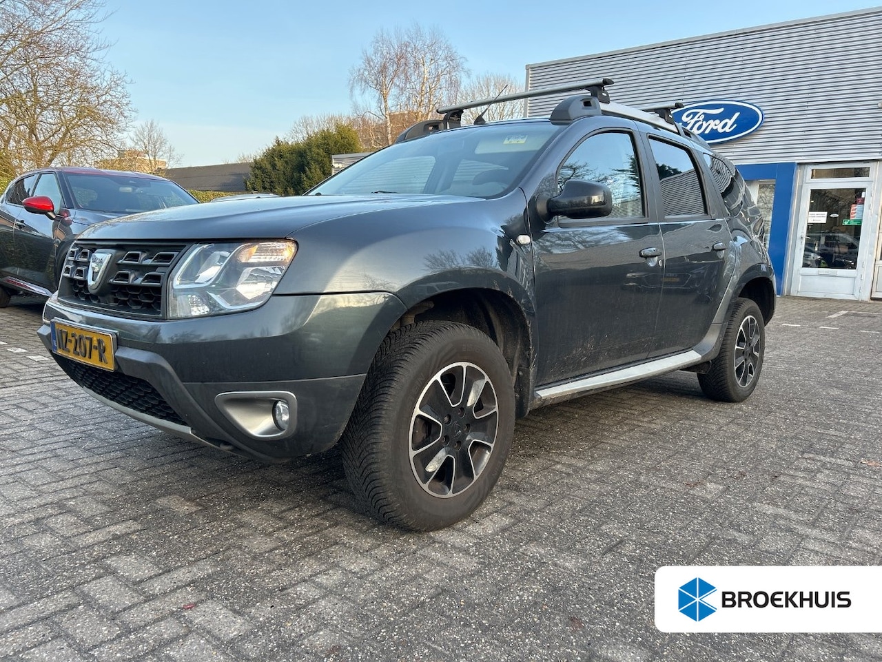 Dacia Duster - 1.2 TCe 4x2 Blackshadow | NL-AUTO! | 1E EIGENAAR! | CRUISE | NAVI | CLIMA | LEDER - AutoWereld.nl