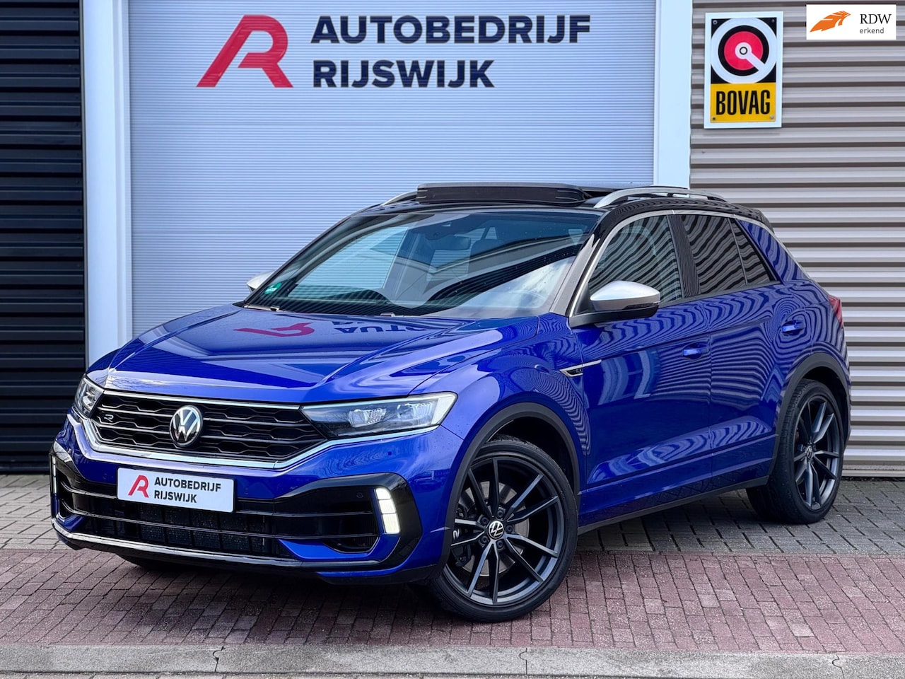 Volkswagen T-Roc - 2.0 TSI 4Motion R Pano/Leer/Akra/Keyless - AutoWereld.nl