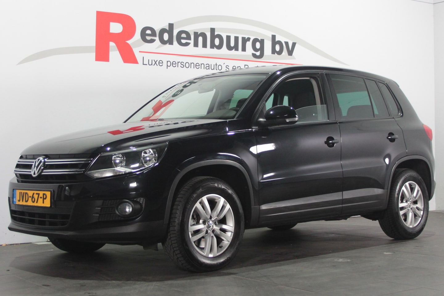 Volkswagen Tiguan - 1.4 TSI Sport&Style - Navi / Camera / Bluetooth - AutoWereld.nl