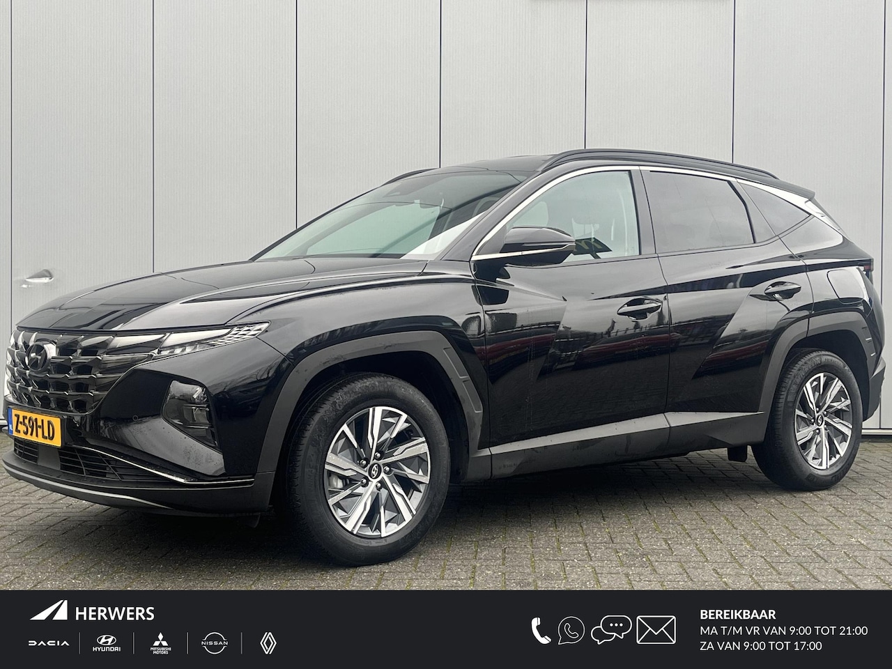 Hyundai Tucson - 1.6 T-GDI HEV Comfort Smart / Elektrische Achterklep / Navigatie / Stoel & Stuurverwarming - AutoWereld.nl