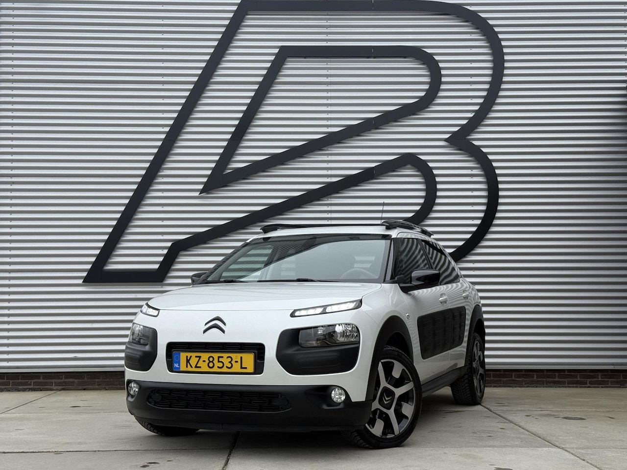Citroën C4 Cactus - 1.2 PureTech Shine Navi|Camera|Clima|Cruise|N.A.P|Netjes Onderhouden|APK tot 12-2026 - AutoWereld.nl