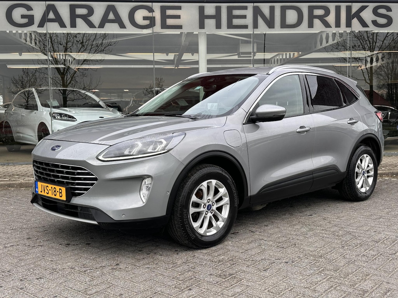 Ford Kuga - 2.5 PHEV Titanium | Winter Pack | Technology Pack | Leder-Stof | HUD | Adaptive CC | Navi - AutoWereld.nl