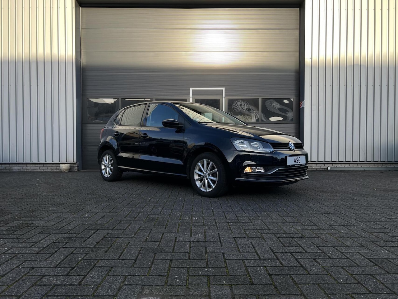 Volkswagen Polo - 1.0 Lounge |Stoelverwarming|Park Sensor|Cruise| - AutoWereld.nl