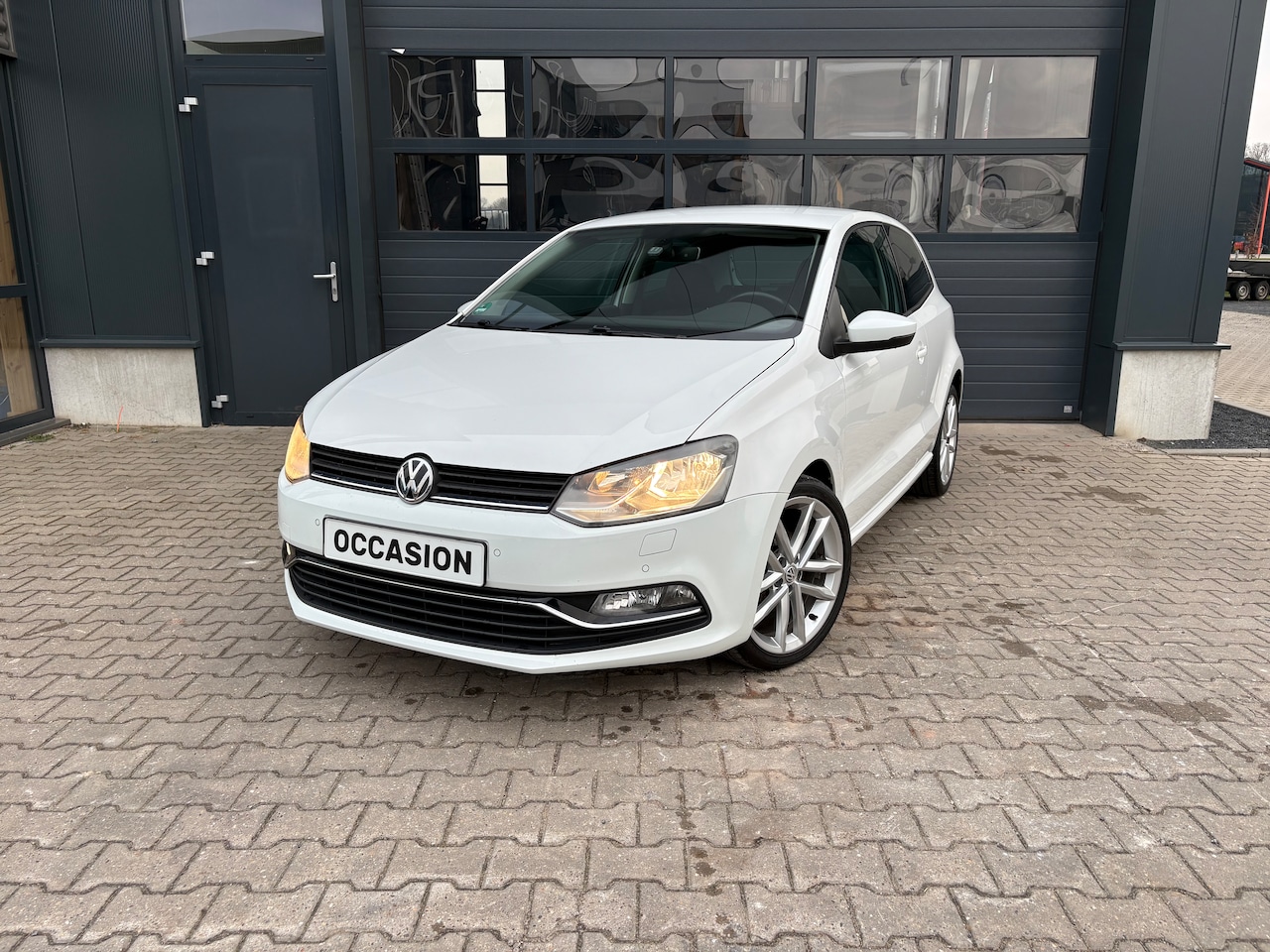 Volkswagen Polo - 1.2 TSI Highline - AutoWereld.nl