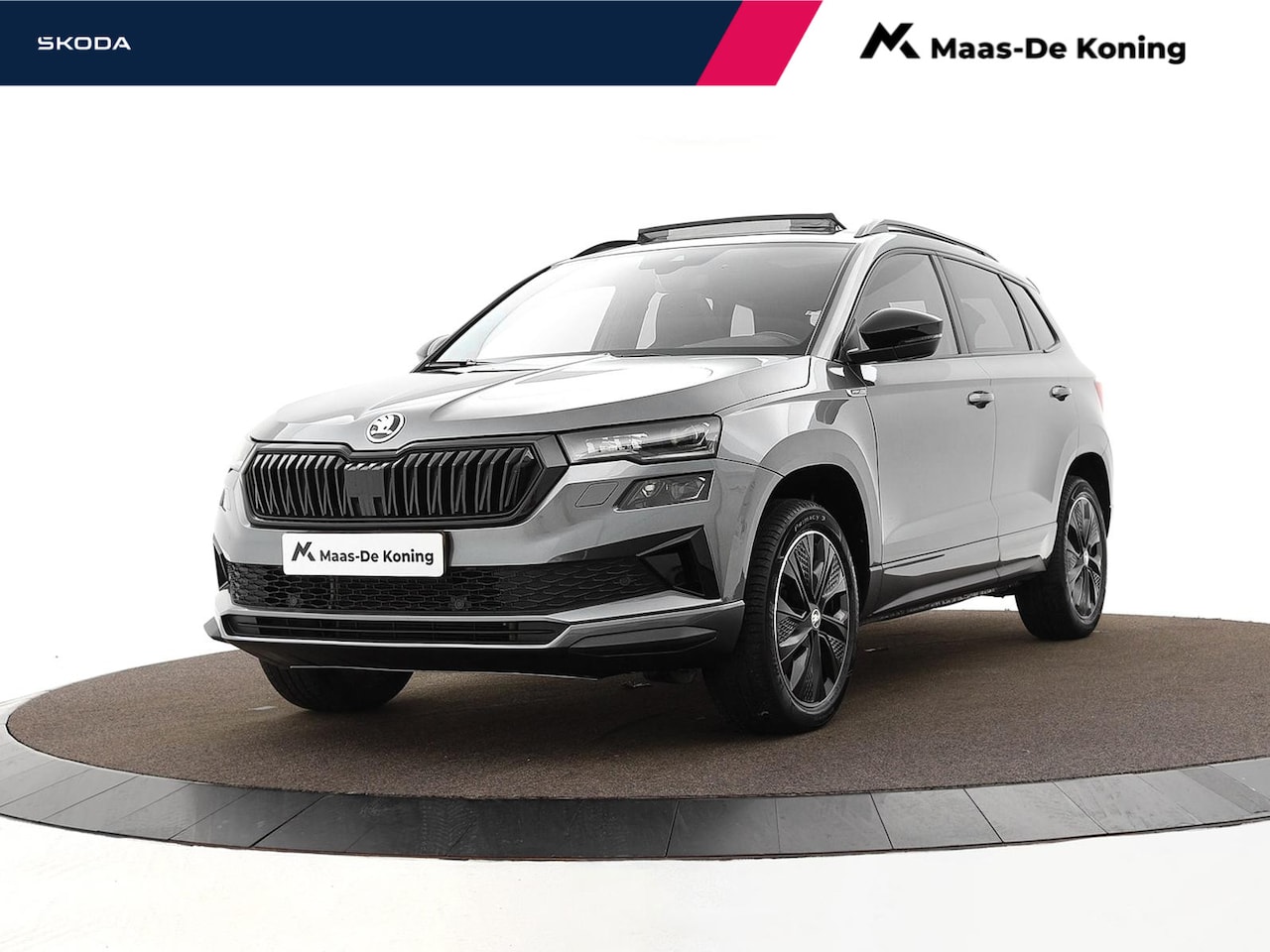 Skoda Karoq - 1.5 TSI 150pk DSG ACT Sportline Business · Panoramadak · Trekhaak · Camera · Keyless · App - AutoWereld.nl