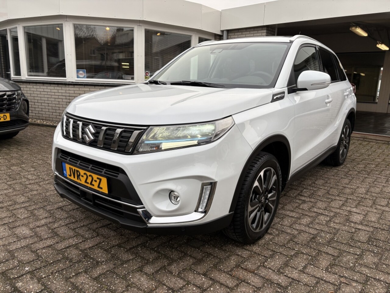Suzuki Vitara - 15 Hybr. Style AUTOMAAT Panodak - AutoWereld.nl