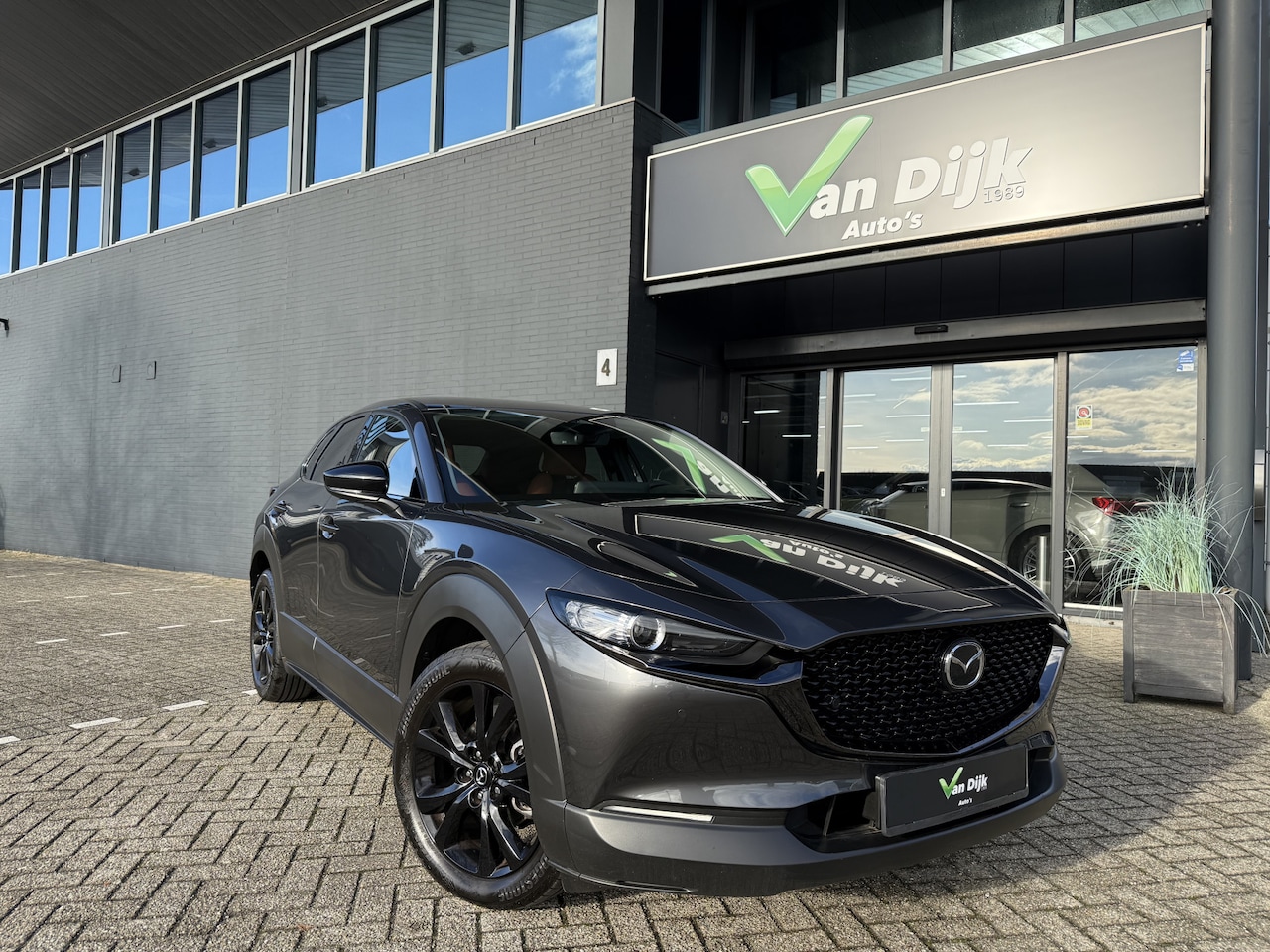 Mazda CX-30 - 2.0 e-M Hybrid Nagisa Leer Navi Camera El.Klep Bose - AutoWereld.nl