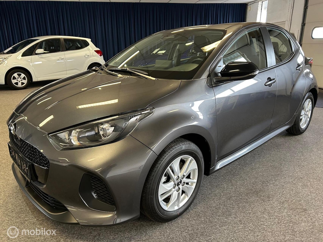 Toyota Yaris - Mazda 2 1.5 Hybrid 116 Dynamic - AutoWereld.nl