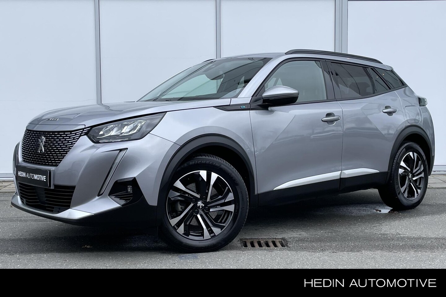 Peugeot e-2008 - EV Blue Lease Allure 50 kWh | Navigatie | Camera | Climate Control | Cruise control | Carp - AutoWereld.nl