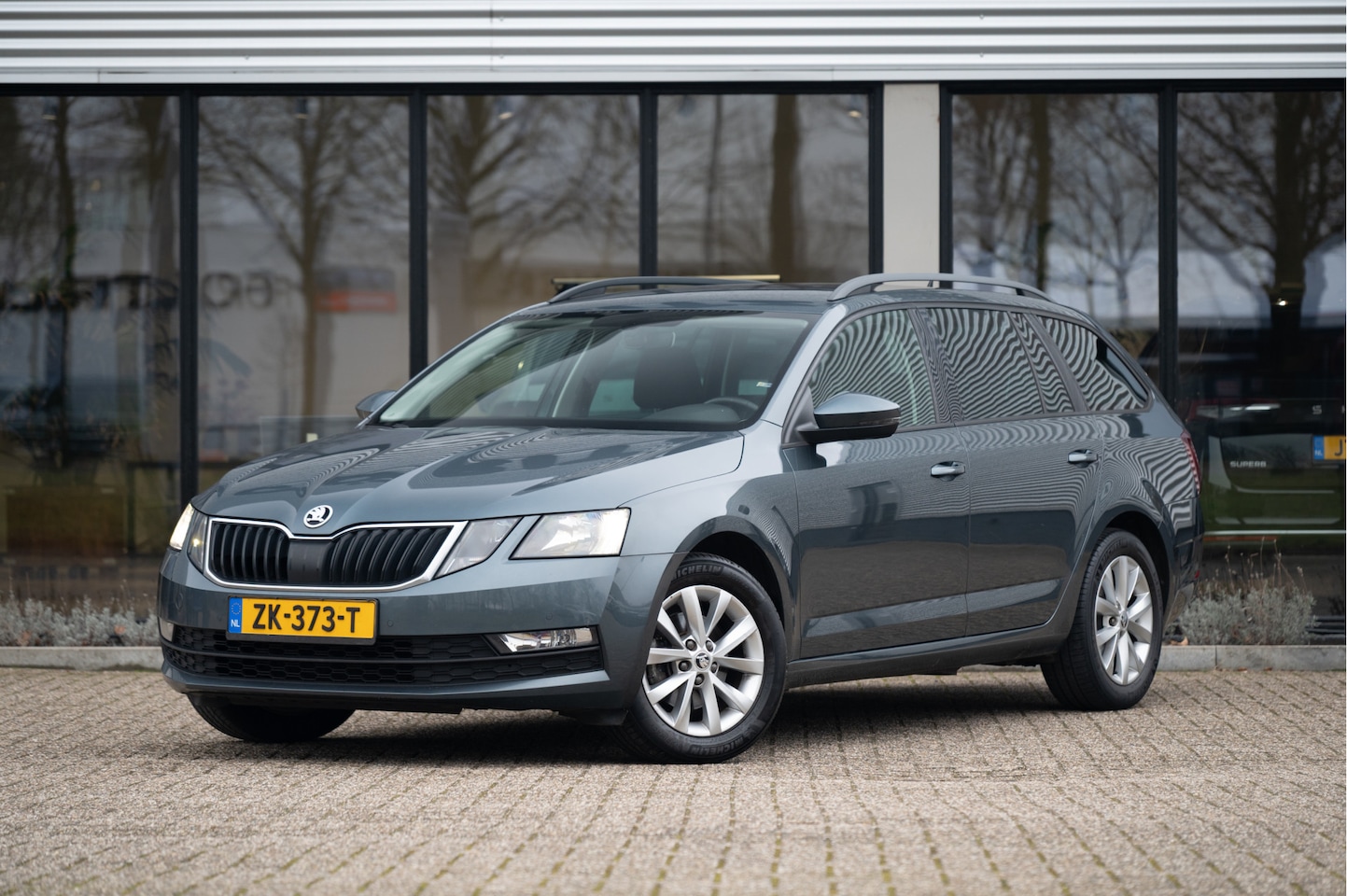 Skoda Octavia Combi - 1.0 TSI Greentech Ambition Business | Navi | Afn. Trekhaak | Apple CarPlay | PDC V+A | Sto - AutoWereld.nl