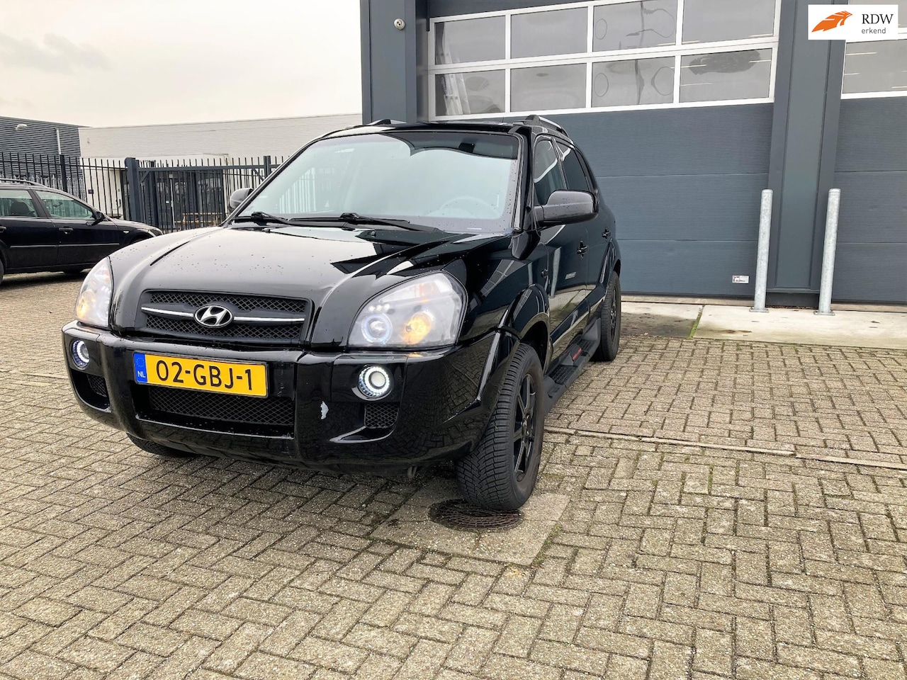 Hyundai Tucson - 2.0i Style Executive Airco ,Pdc,... - AutoWereld.nl