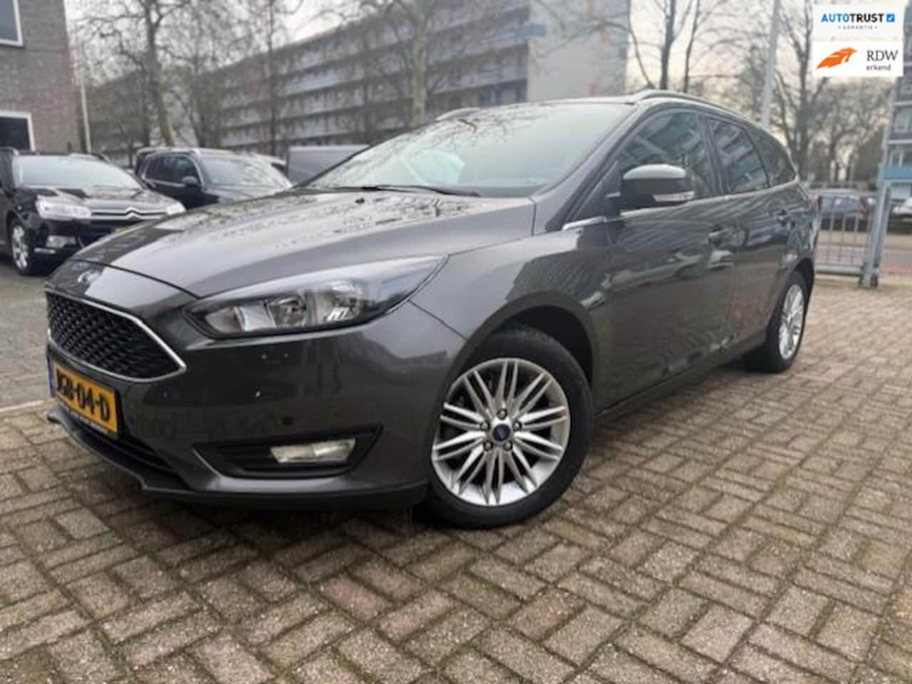 Ford Focus Wagon - 1.0 Trend Navi/Clima/Cruise - AutoWereld.nl