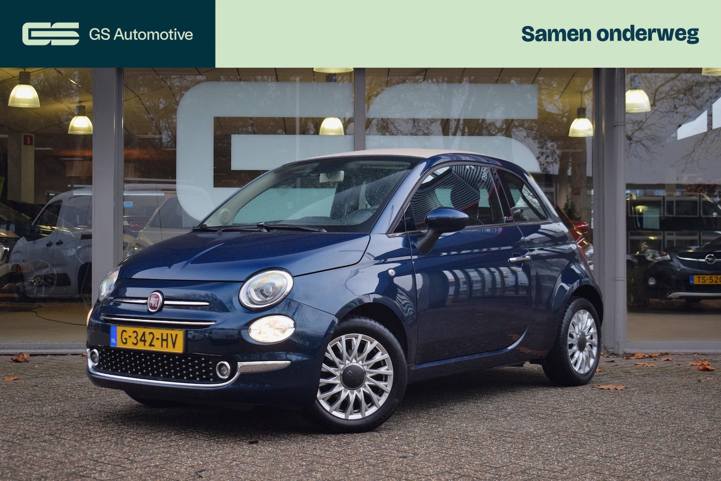 Fiat 500 C - 0.9 TwinAir Turbo Lounge NAV|AC|GR.SCHERM|CRUISE - AutoWereld.nl