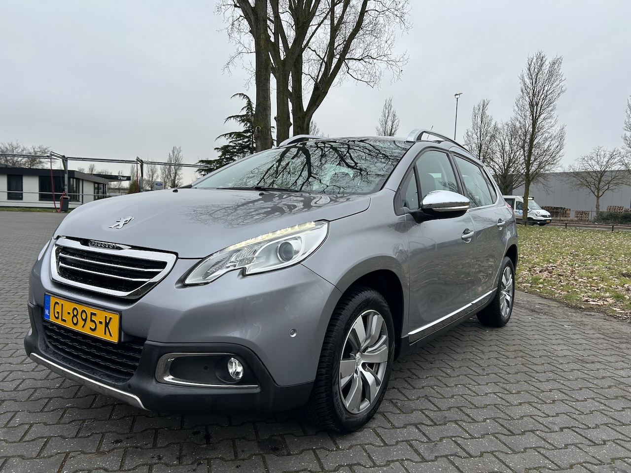 Peugeot 2008 - 1.2 PureTech Allure Cruise | PDC - AutoWereld.nl