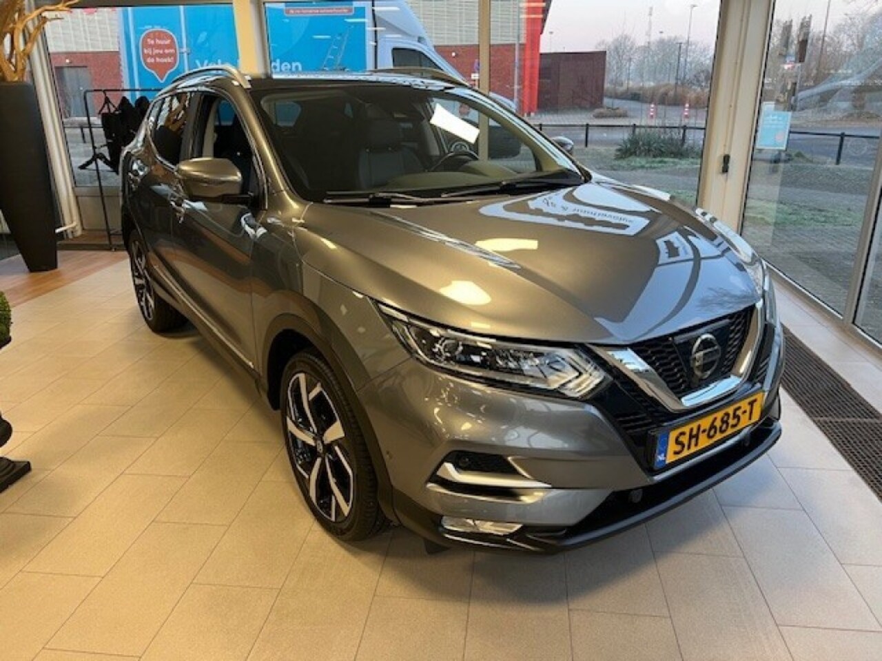 Nissan Qashqai - 1.2 Tekna Panoramadak Stoelverwarming Cruise controle. - AutoWereld.nl