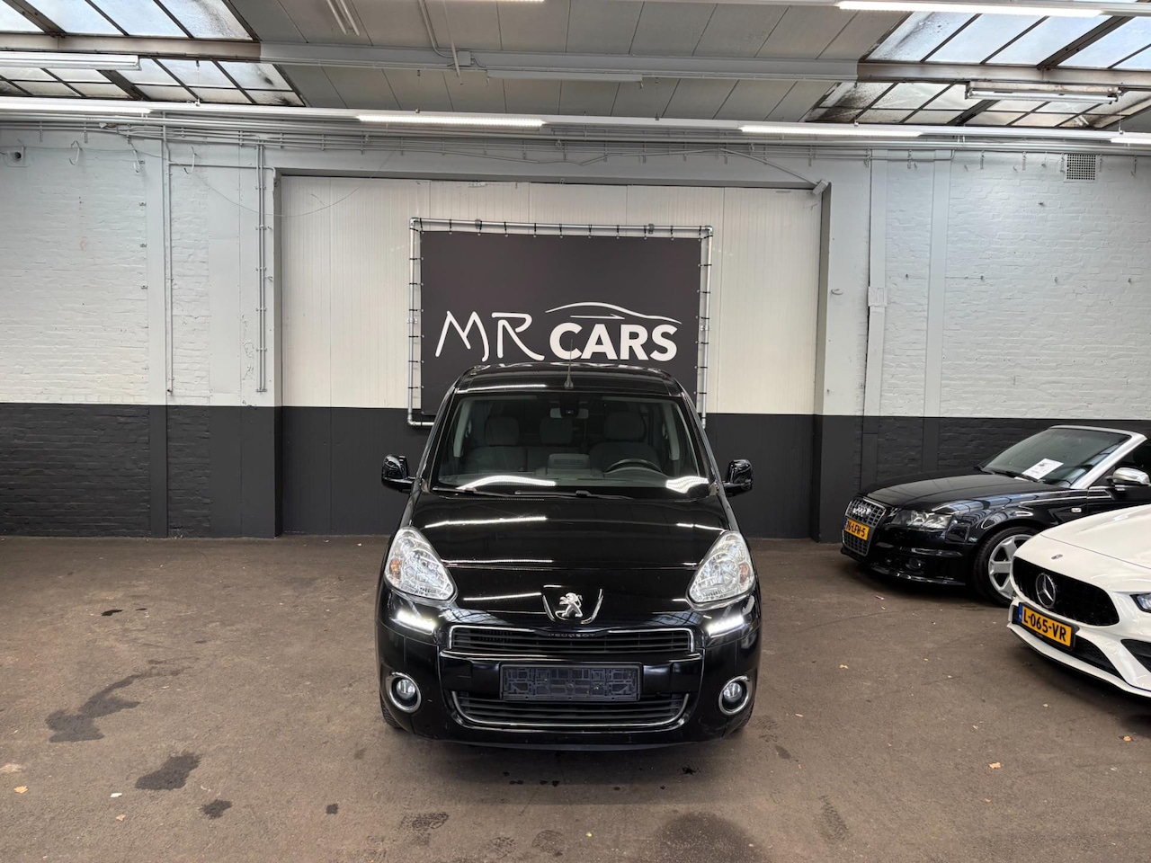 Peugeot Partner - 120 1.6 e-HDI L1 Navteq Airco - AutoWereld.nl