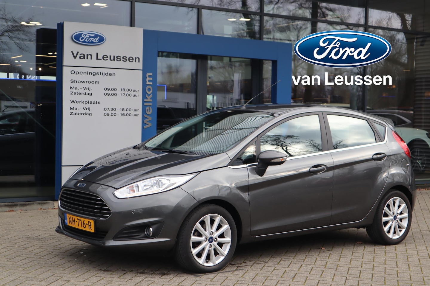 Ford Fiesta - 100PK TITANIUM 5-DEURS DISTR.RIEM-VERVANGEN! NAVIGATIE PARK-SENSOREN LM-VELGEN CLIMA VOORR - AutoWereld.nl