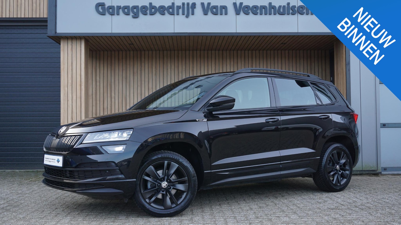 Skoda Karoq - 1.5 TSI ACT Sportline Business Virtual Navi A-Camera Sfeerverlichting Adaptive Cruise Keyl - AutoWereld.nl