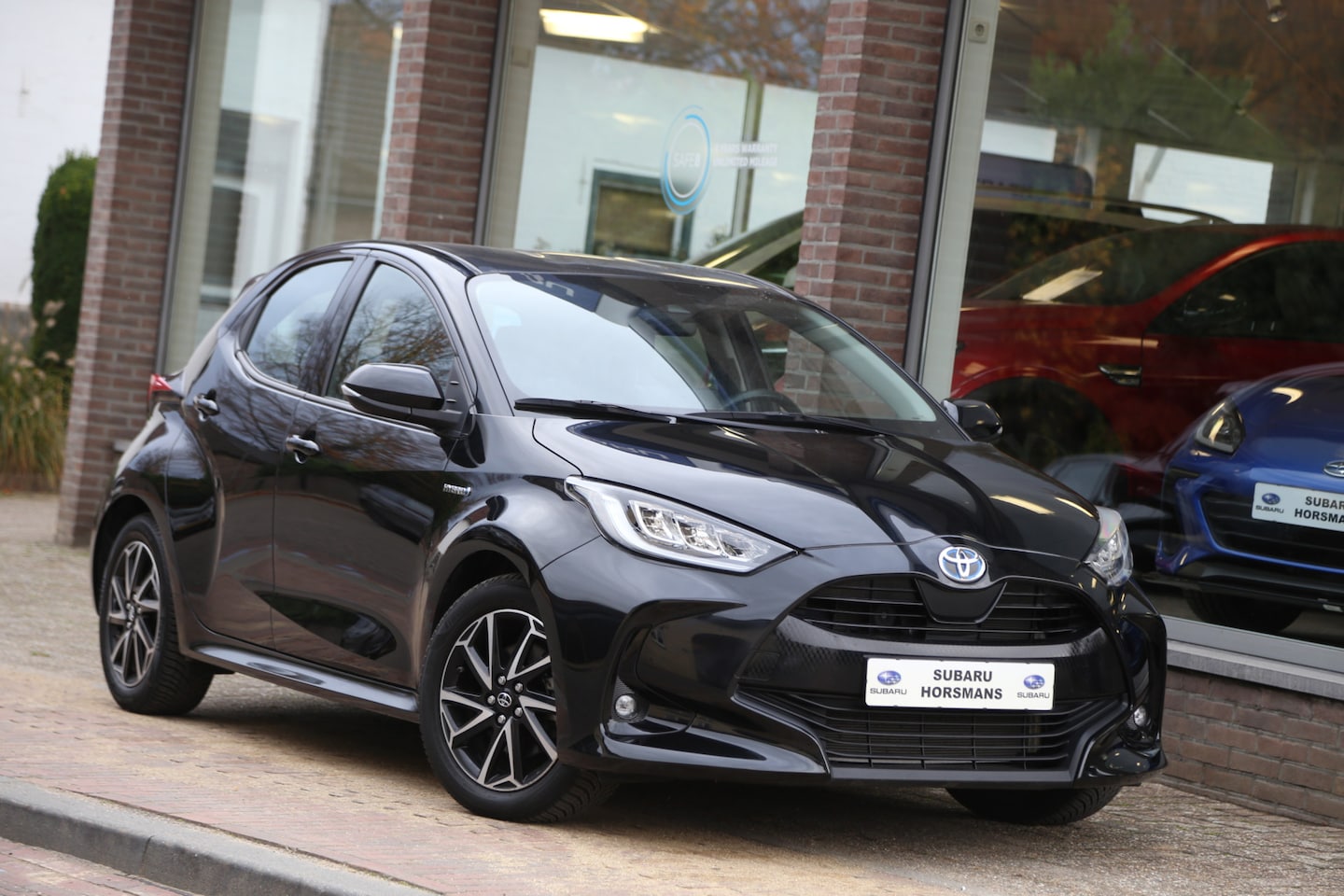 Toyota Yaris - 1.5 Hybrid Dynamic Navi LED Camera ACC - AutoWereld.nl