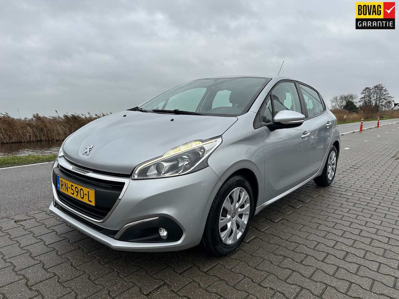 Peugeot 208 - 1.2 PureTech Blue Lion 1.2 PureTech Blue Lion, Airco, Carplay, Cruisecontrol, Navigatie, PDC. - AutoWereld.nl