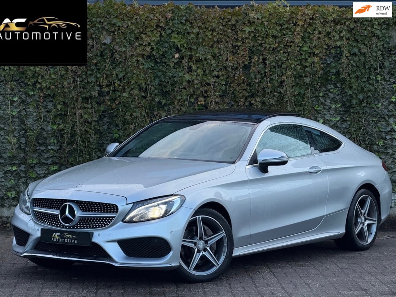 Mercedes-Benz C-klasse Coupé - 200 AMG-Line Pano/Automaat/Leder - AutoWereld.nl