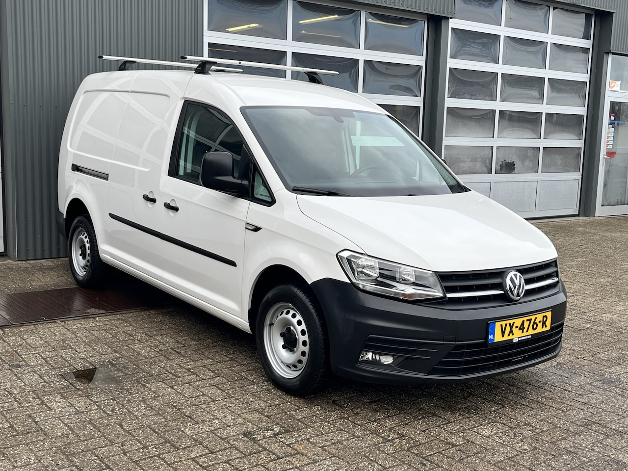 Volkswagen Caddy Maxi - 2.0 TDI L2H1 Airco Cruise controle Telefoonvoorbereiding Schuifdeur Laderkasten Houten laa - AutoWereld.nl