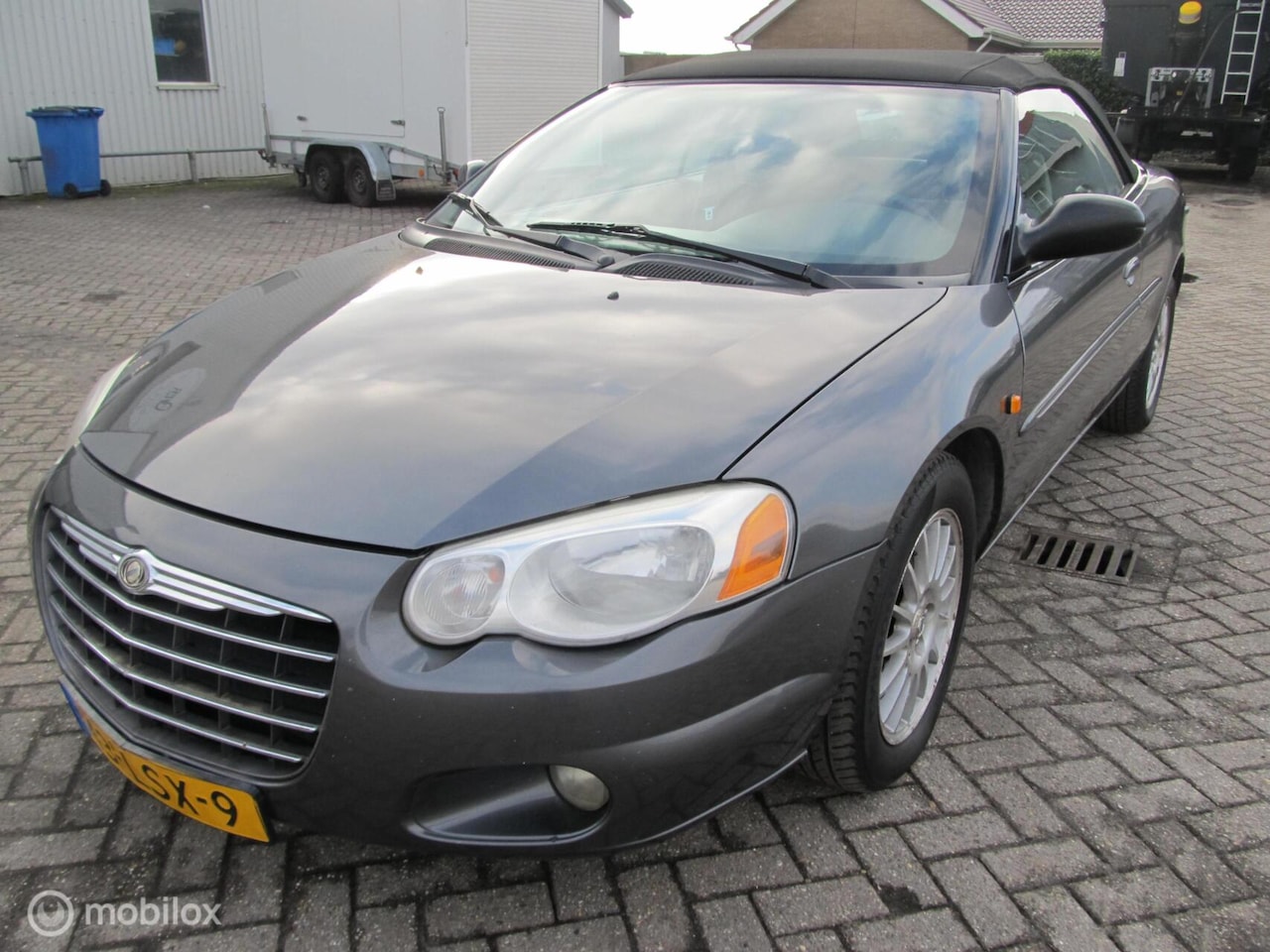Chrysler Sebring Cabrio - 2.7i V6 Touring Convertible, 132146 Mijl - AutoWereld.nl