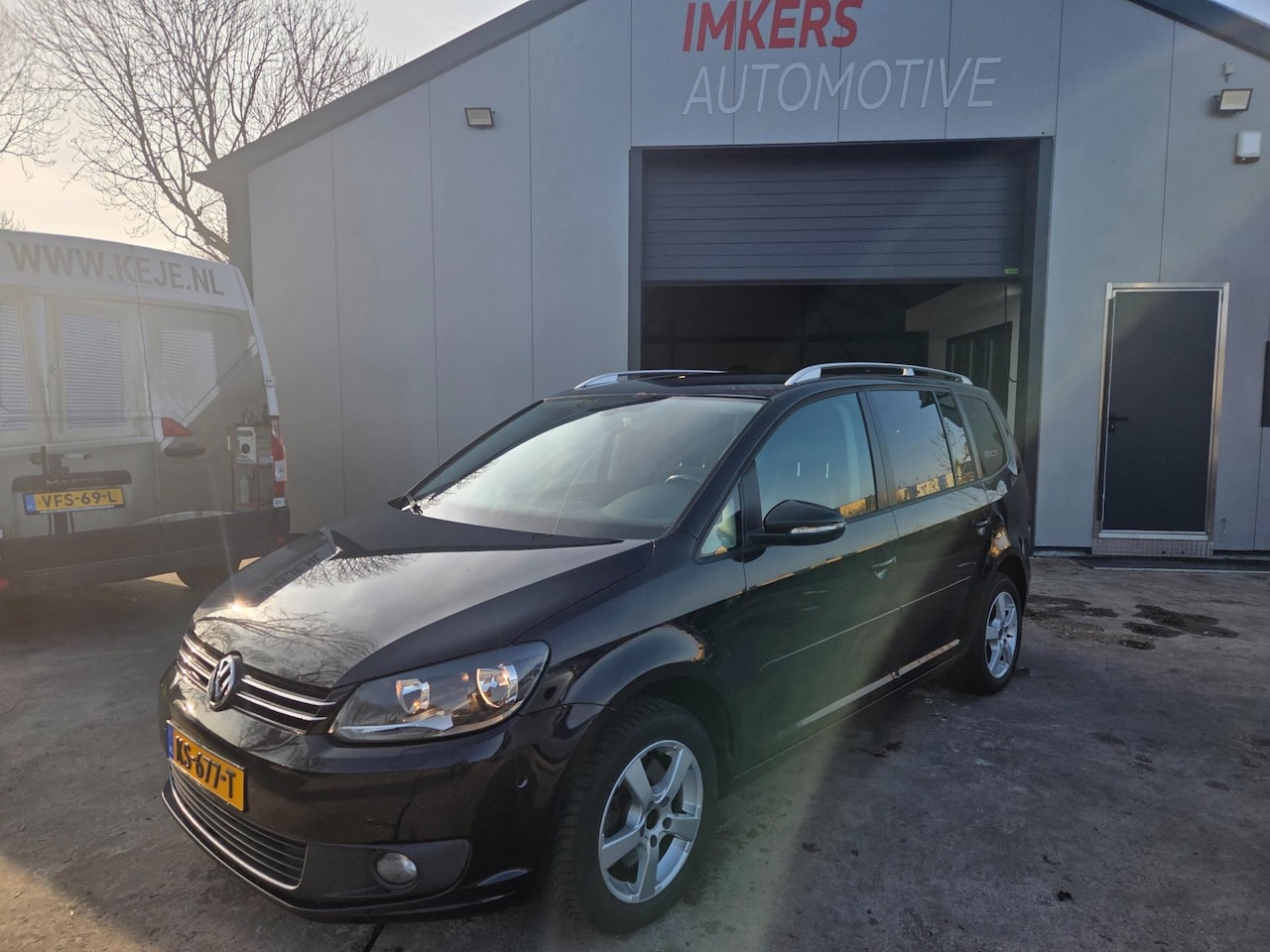 Volkswagen Touran - 2.0 TDI Comfortline AUT | Navi | Stoelverw. | 7 Pers. - AutoWereld.nl