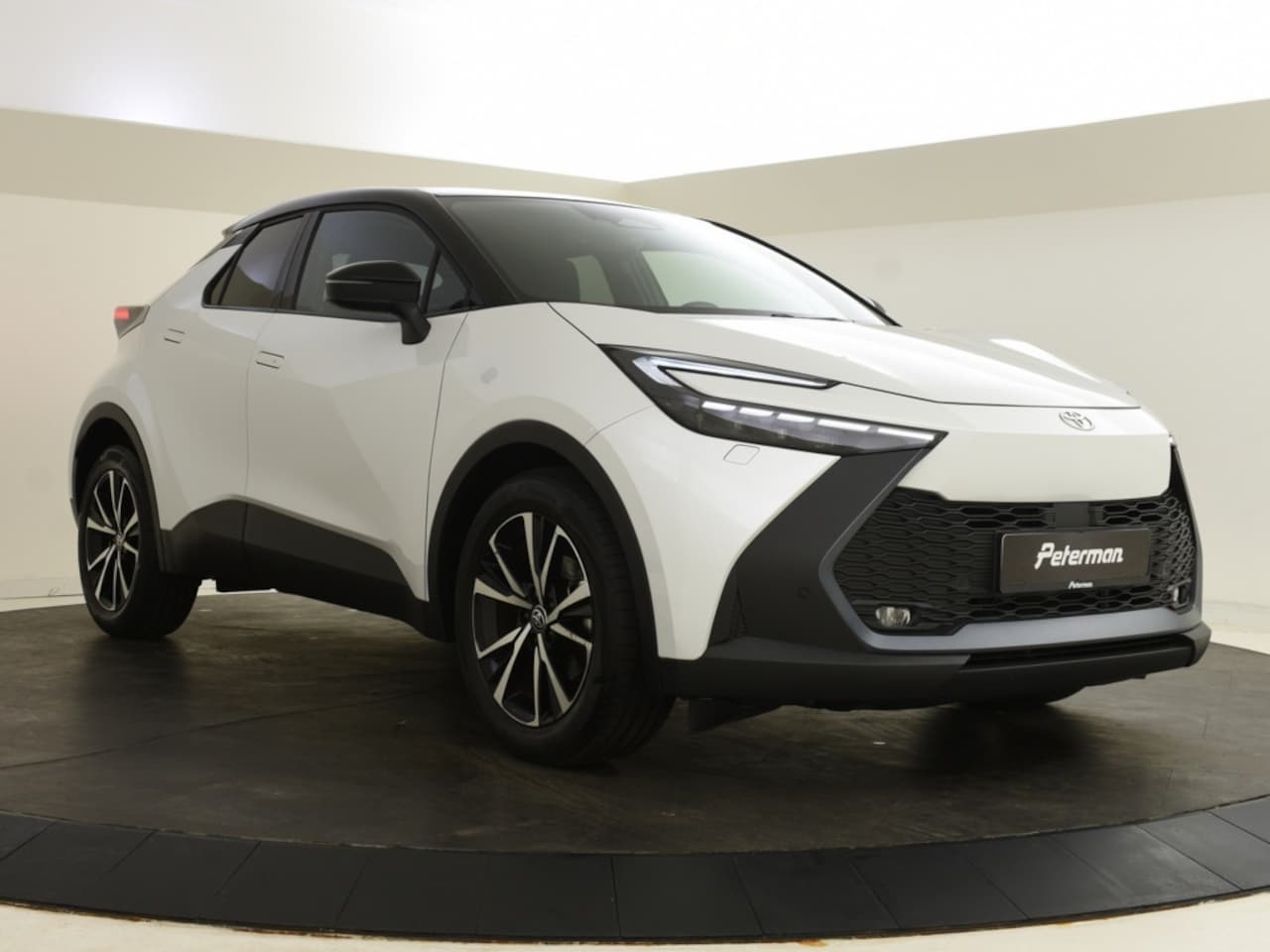 Toyota C-HR - 1.8 Hybrid 140 Style Bi Tone | Elektrische A. Klep | Blindspot - AutoWereld.nl