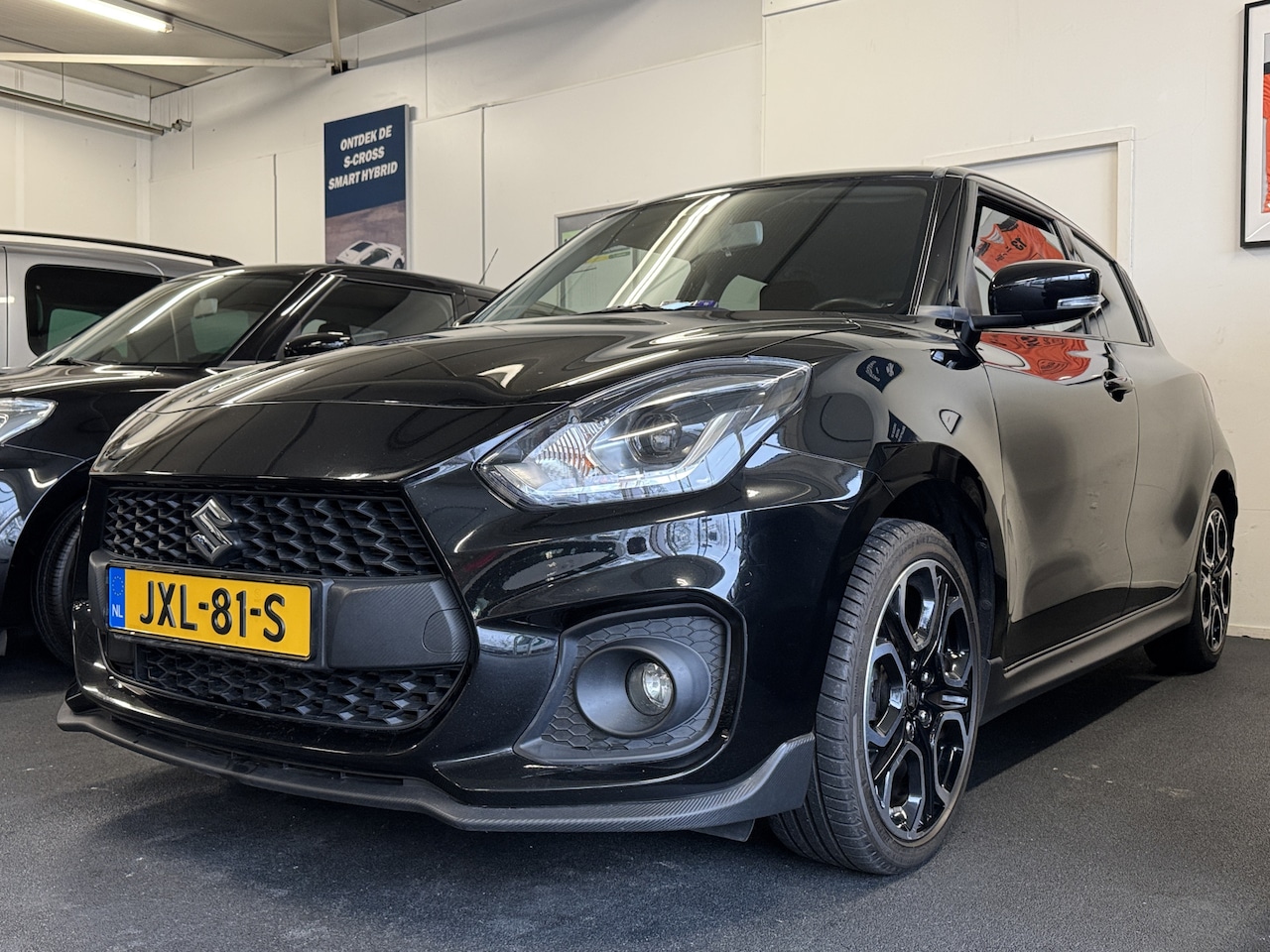 Suzuki Swift - 1.4 Sport Smart Hybrid * Achteruitrijcamera * Stoelverwarming * - AutoWereld.nl