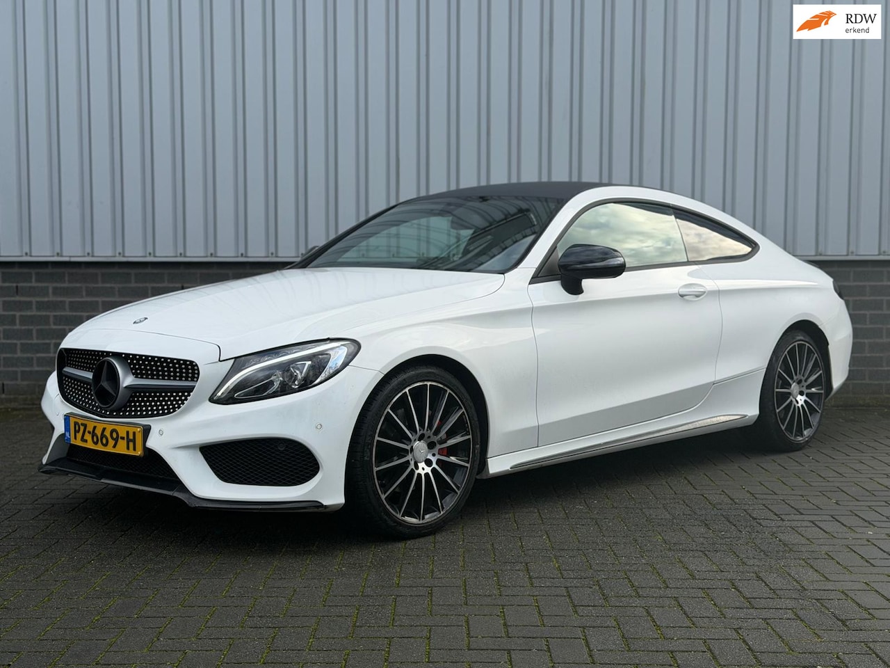 Mercedes-Benz C-klasse Coupé - 180 Prestige |AUTOMAAT|AMG|LEDER| - AutoWereld.nl