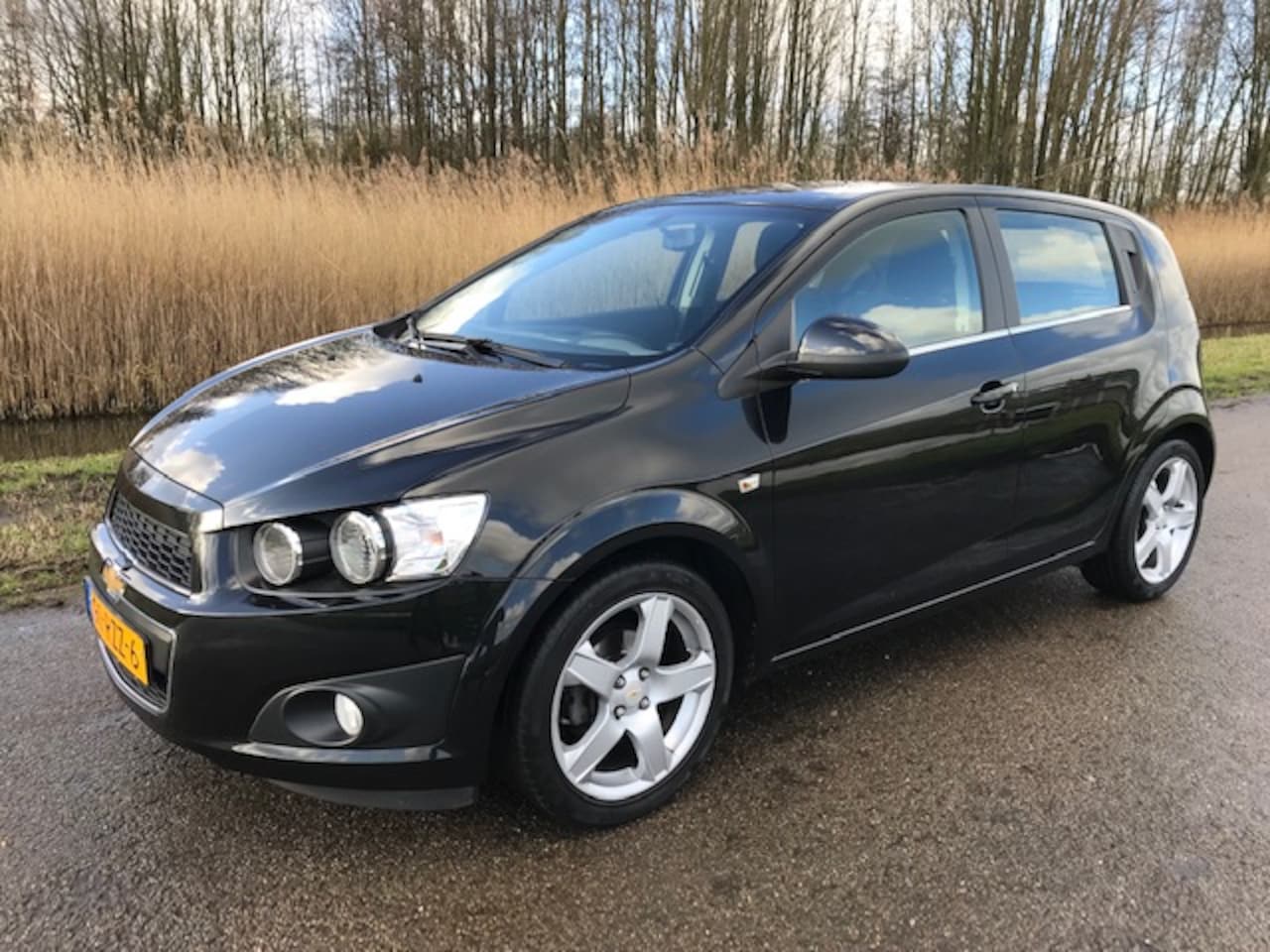 Chevrolet Aveo - 1.4 LTZ 5- Drs | Airco | trekhaak | NAP | Rijklaar prijs! - AutoWereld.nl