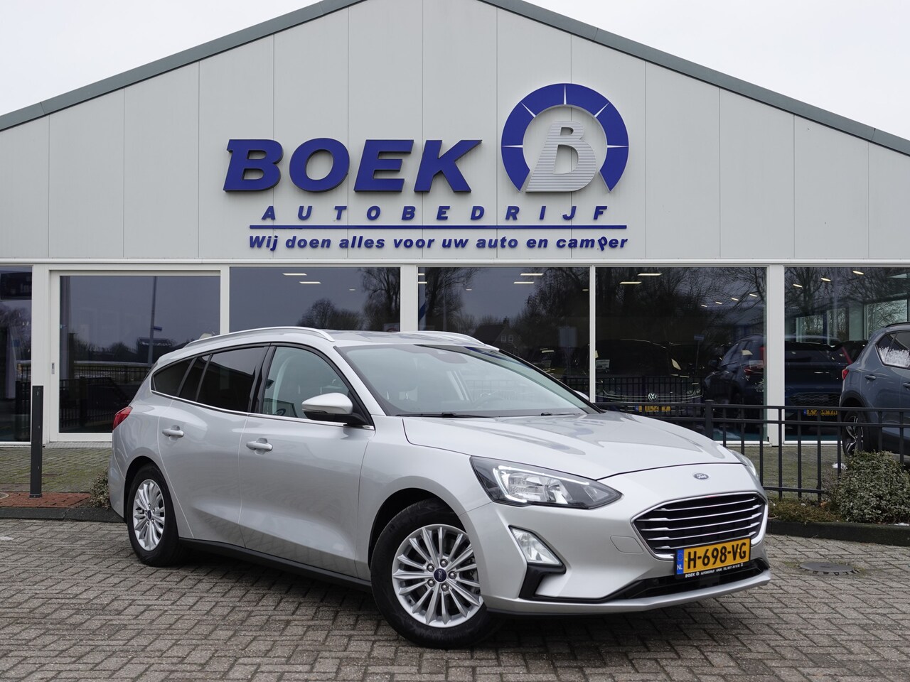 Ford Focus Wagon - 1.0 EcoBoost 125PK Titanium AUTOM. | TREKH. | WINTER | NAVI | CRUISE - AutoWereld.nl