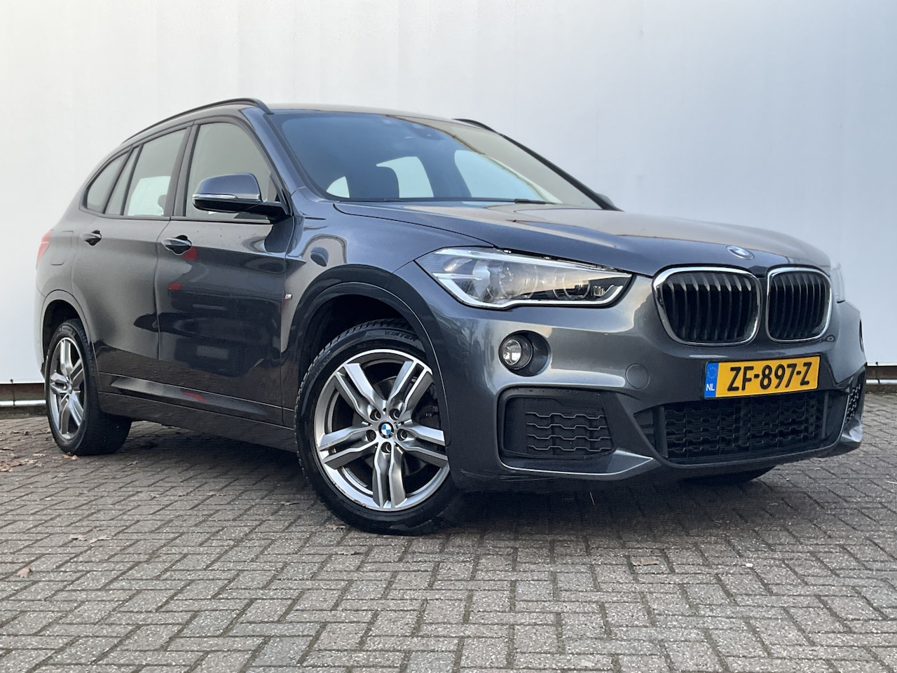 BMW X1 - 18i 140pk M-Sport Executive Edition Clima Cruise Head up Display - AutoWereld.nl