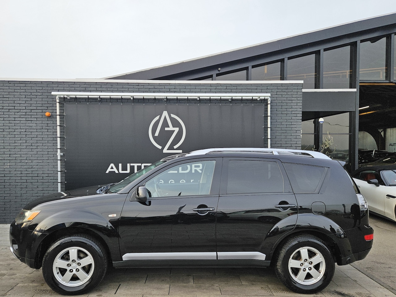 Mitsubishi Outlander - 2.4 Intro Edition 2WD *LPG-G3*AC* - AutoWereld.nl